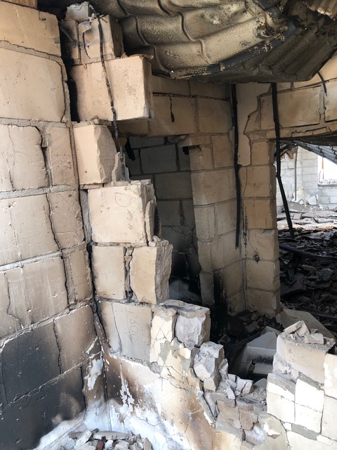 Another image from Irpin by Victor G. This is the collapsing rubble of a building. Again only the bones stand, cinderblocks and mortar, exposed rebar. 